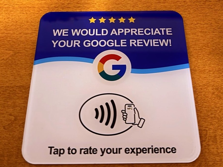 4.75 inch square acrylic Google review placard reading We would appreciate your Google review, with an NFC tap symbol.